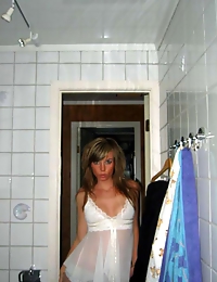 Hot chick flaunting her body in a sexy white nightgown