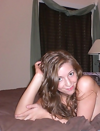 Pictures of a busty chick posing naked in her room